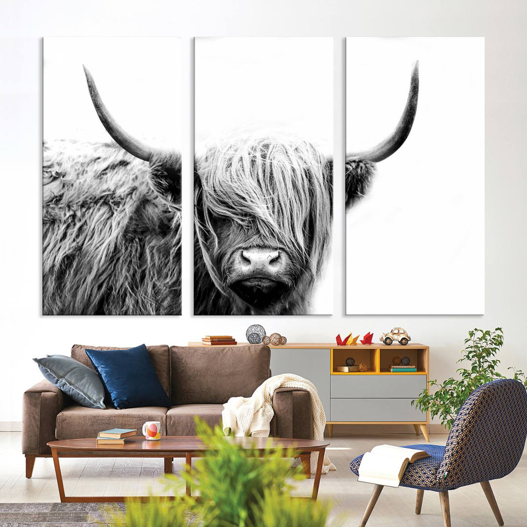 A museum-quality triptych titled "Black White Scottish Highland Cow Cattle Art Print Farmhouse Wall Art Canvas Print" embellishes the dark wall. The canvas is equipped with a UV-protective coating to ensure lasting vibrancy.