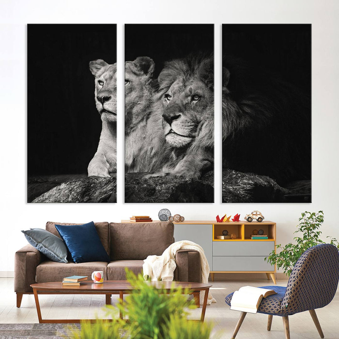 The elegant wildlife portrait, "Lion Couple Canvas Wall Art Print," featuring a black and white depiction of a lion family, majestically decorates the living room wall.