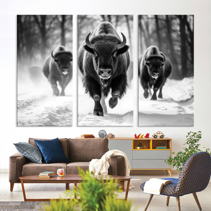 Transform your living room with the Buffalo Wall Art Canvas Print triptych, showcasing a bison family in motion across a snowy landscape. This striking Western decor piece becomes the focal point of any room.