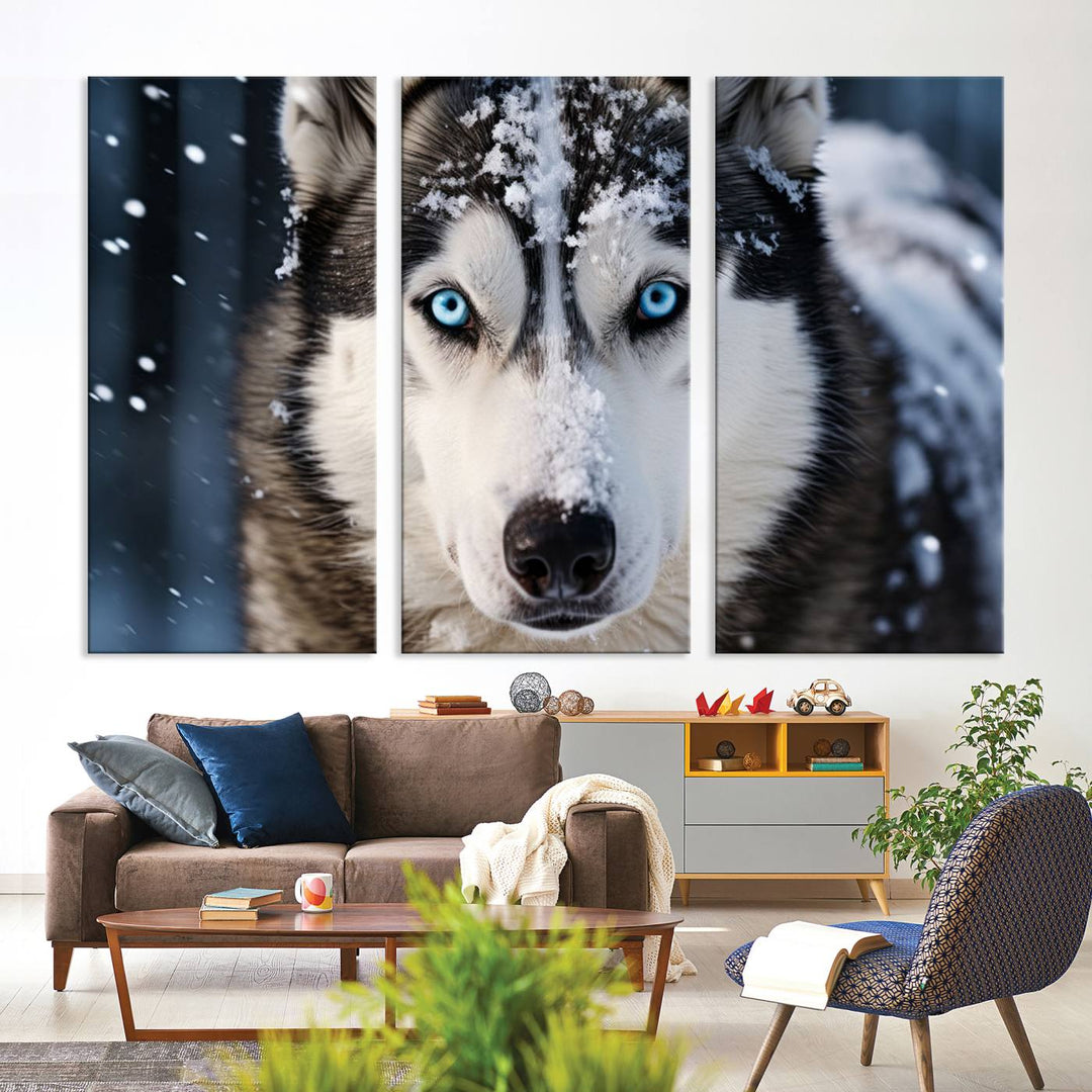 A digital art piece titled "Winter Siberian Husky Wolf Wall Art Canvas Print" showcases a blue-eyed husky blanketed in snow. Printed on high-quality canvas, it is an ideal choice for nature and dog enthusiasts.