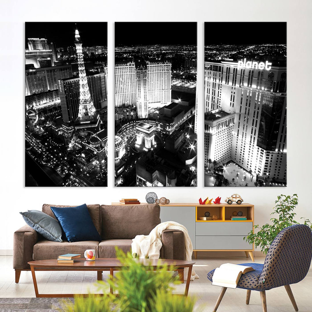 The Las Vegas Wall Art Canvas Print is a black and white triptych that showcases a city skyline at night. Crafted on museum-quality canvas with a UV-protective coating, it serves as an elegant and ready-to-hang focal point in the room.