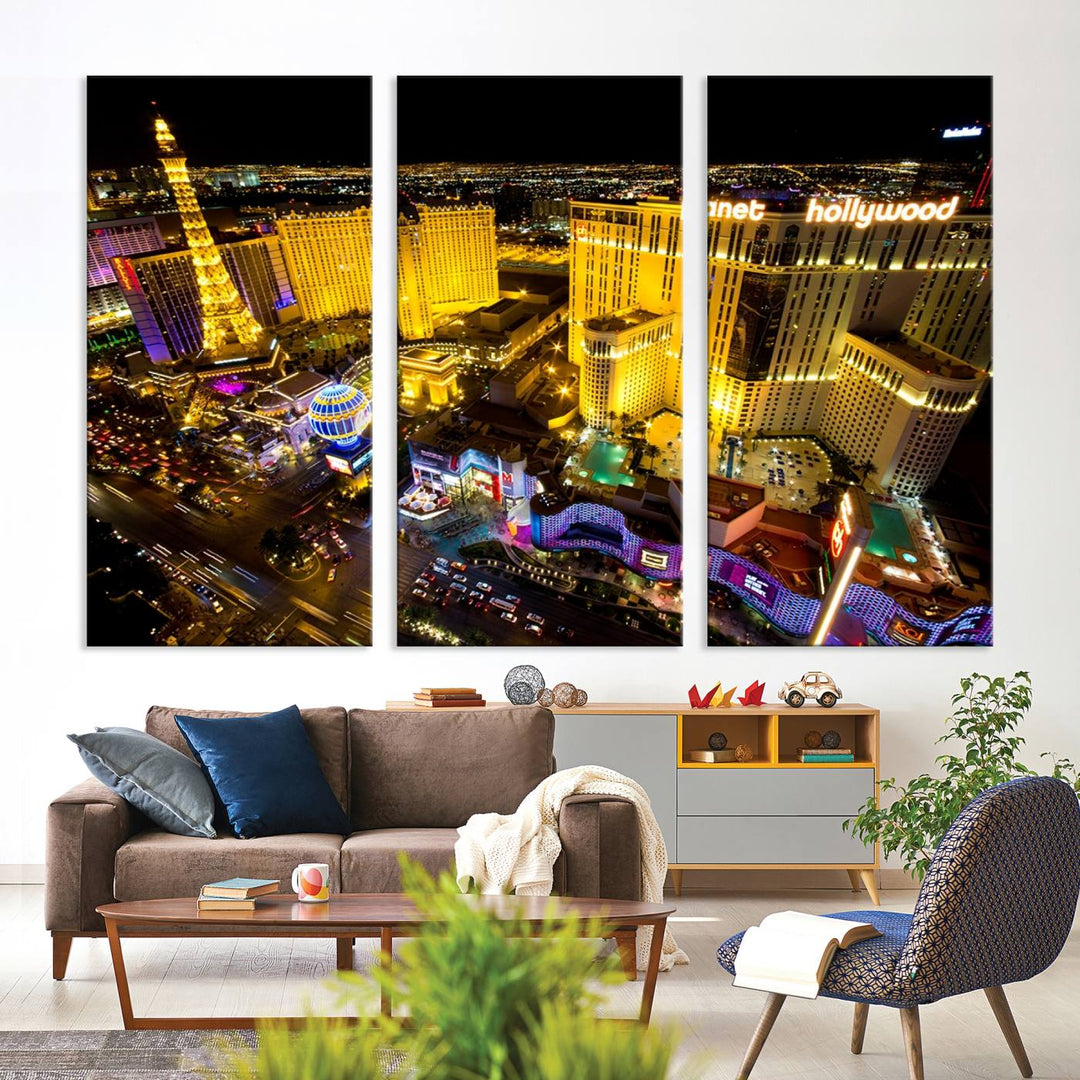 The modern living room features a Las Vegas Wall Art Canvas Print, a museum-quality triptych showcasing a vibrant cityscape with neon lights.