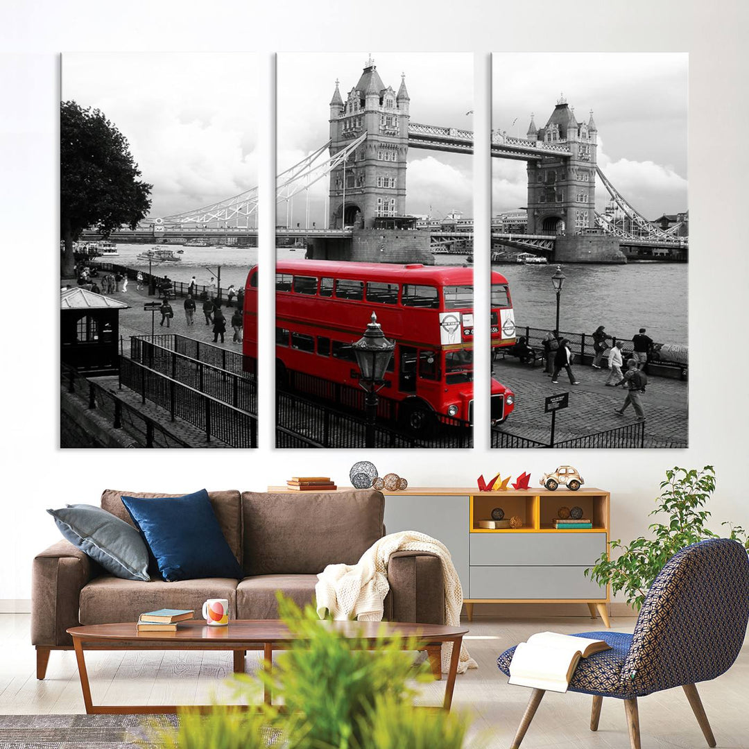 The London Red Bus and Bridge Wall Art Canvas Print showcases a red London bus in front of Tower Bridge, beautifully presented as a gallery-wrapped canvas. This striking image is divided into three panels, delivering a museum-quality display that's ready to hang.