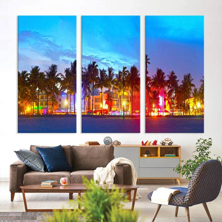 The living room features a three-panel Miami City Wall Art Canvas Print, showcasing a colorful, illuminated beach scene with palm trees on museum-quality canvas.