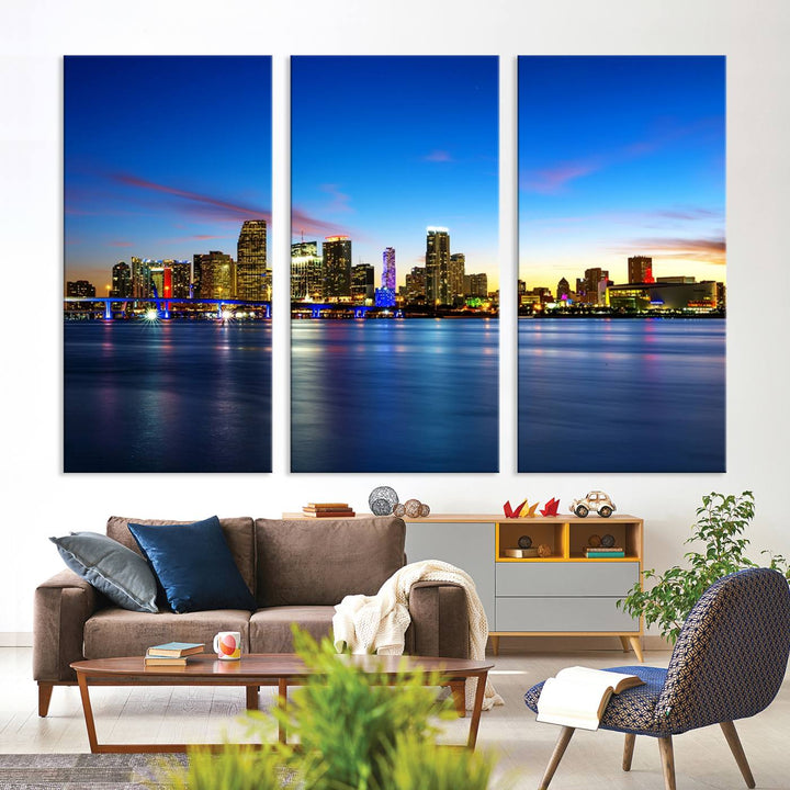 The living room features a Miami City Wall Art Canvas Print—a gallery-wrapped triptych displaying a city skyline at dusk, adding museum-quality elegance to the space.