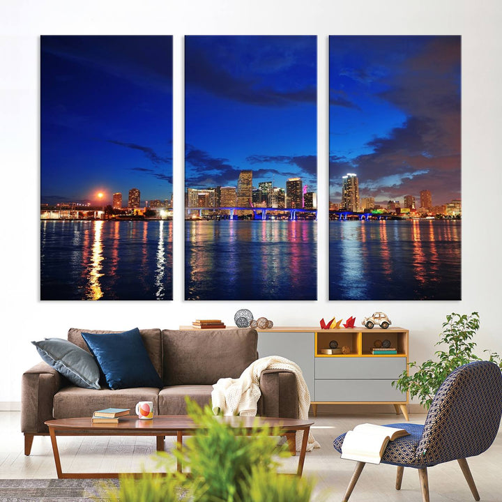 A large Miami City View Wall Art Canvas Print featuring the Miami City Skyline Panorama at night is displayed above the dresser.