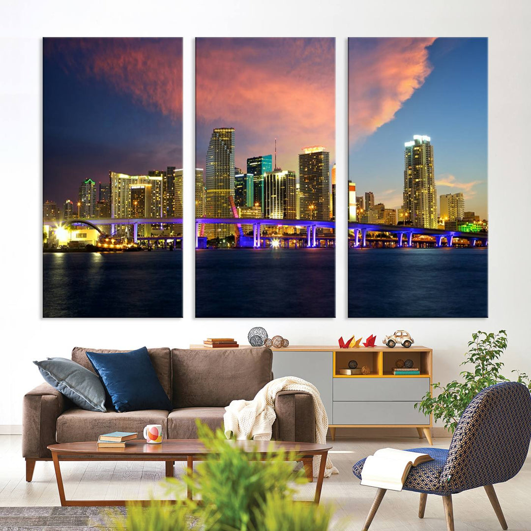 The modern living room is enhanced by the "Miami City Wall Art Canvas Print," a stunning triptych portraying a city skyline at sunset. These canvases are gallery wrapped and made from museum-quality materials, featuring a UV-protective coating to ensure lasting vibrancy.