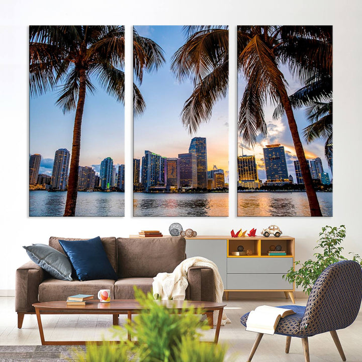 The Wall Art MIAMI Canvas Print features a triptych design depicting palm trees and a city skyline at sunset.