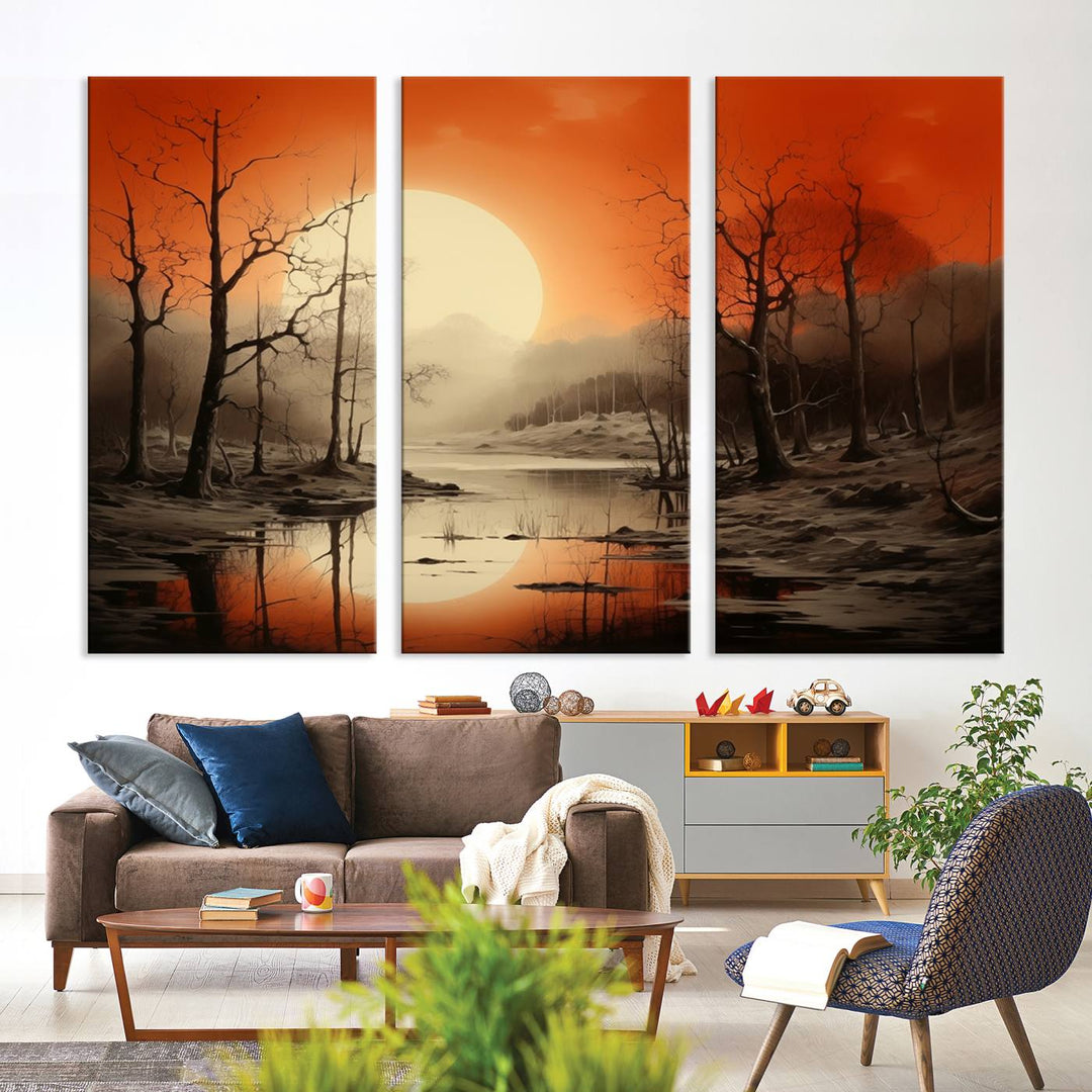 The "Abstract Watercolor Trees and Sunset on Lake Wall Art" is a triptych masterpiece, showcasing an orange-hued landscape of barren trees and a large sun. Displayed on museum-quality canvases with UV-protective coating, it creates a striking visual element in any space.