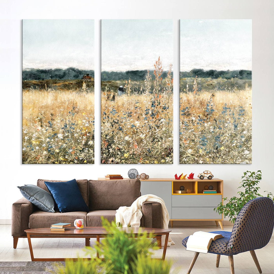 The "Wildflower Field Wall Art Canvas" brings rustic charm to the room with its nature-inspired landscape print, making it a perfect addition to the living room or office.