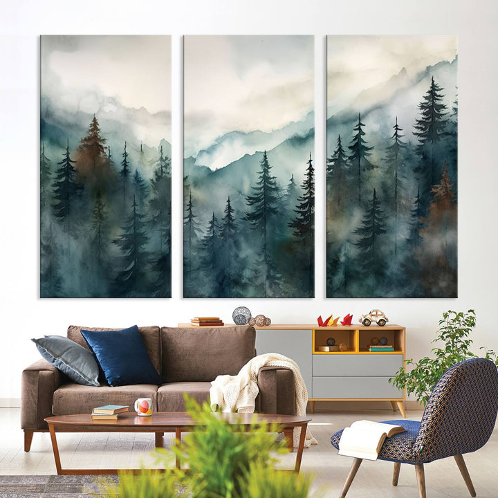 A set of Serenity Forest Wall Art Canvas prints, showcasing foggy mountain landscapes, is displayed in the living room.