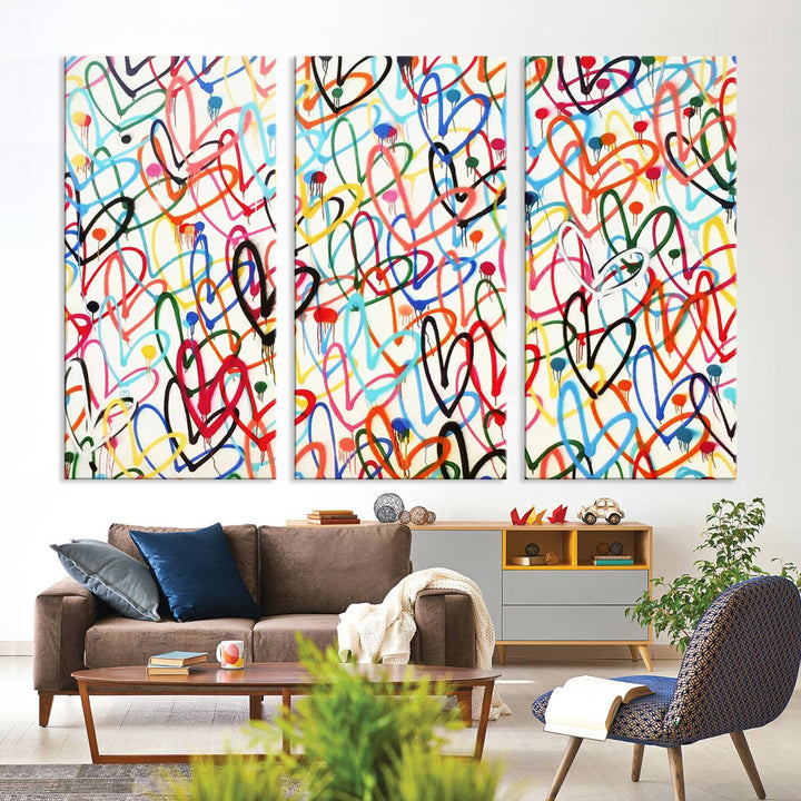 The "Colorful Love Canvas print," featuring vibrant abstract street art with overlapping loops, is handmade in the USA.