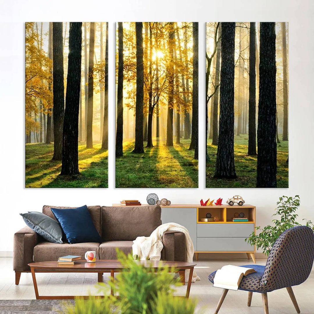 The living room is enhanced by the "Wall Art Landscape Canvas Print Tall Trees in Forest at Sunset" on museum-quality canvas. This triptych, complete with a UV-protective coating, is ready to hang and adds an artistic touch to the space.