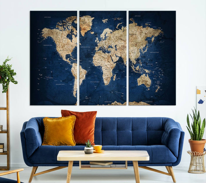 A triptych canvas print titled "Vintage Blue World Map Canvas Print - Classic World Map Design on Deep Blue Wall Art Print" adorns the wall, enhancing the decor with its antique style.