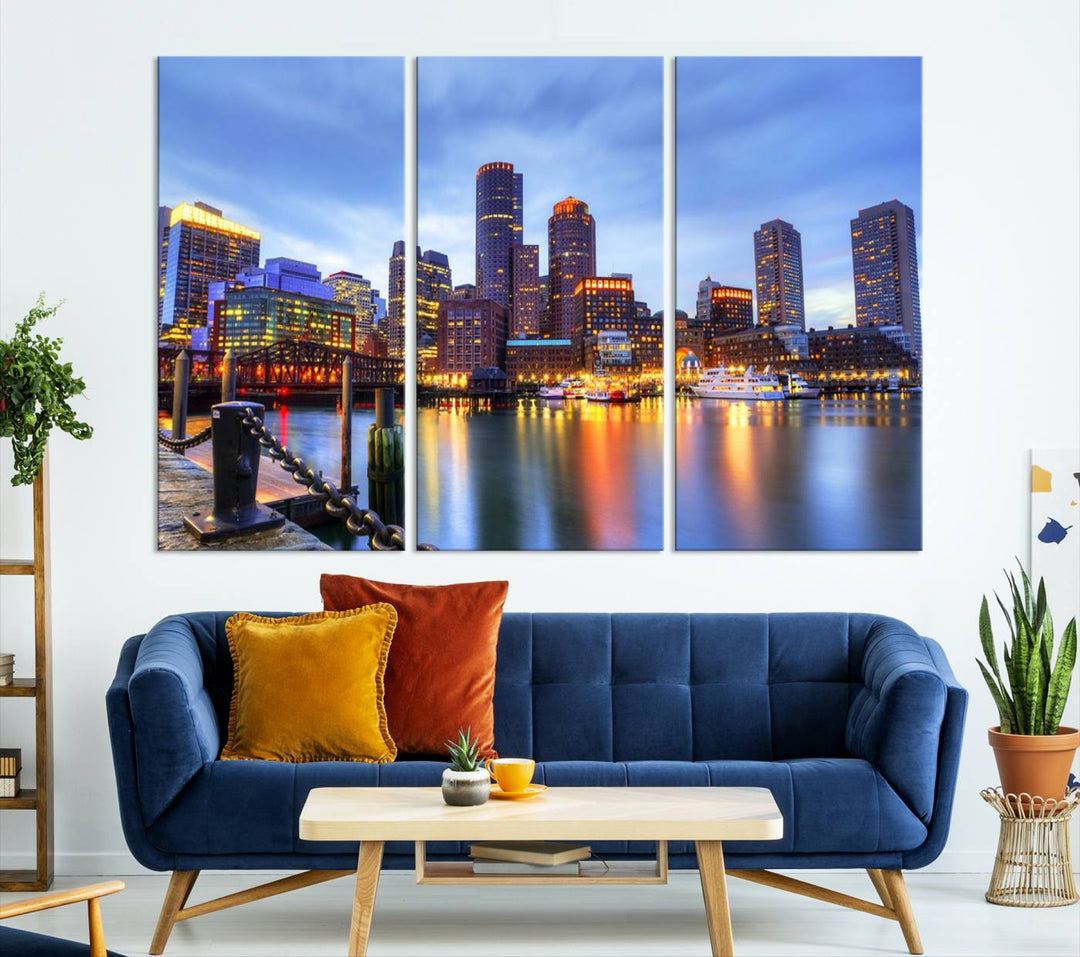 The Boston City Lights Sunset Cloudy Blue Skyline Cityscape View Wall Art Canvas Print embellishes a contemporary living room. This gallery-wrapped canvas set guarantees museum-quality canvases to enhance any space.