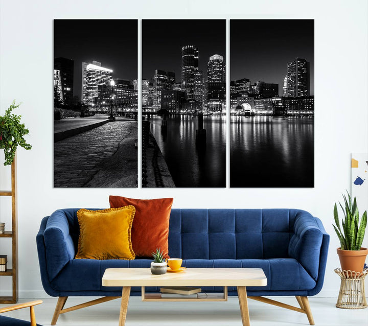 The Boston Lights Skyline Black and White Wall Art Cityscape Canvas Print, crafted with museum-quality canvas and UV-protective coating, serves as a striking triptych centerpiece in the living room.