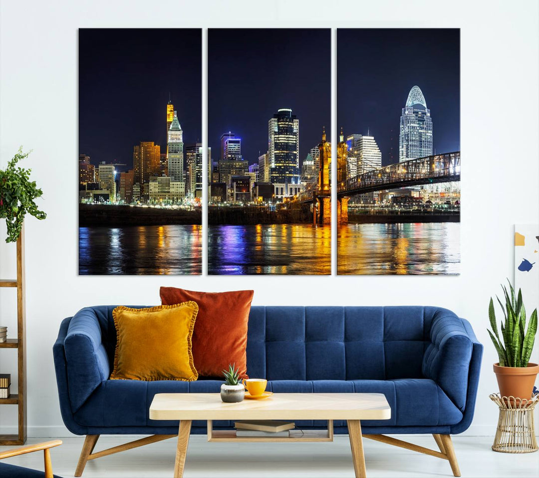 The Cincinnati City Lights Night Skyline Cityscape View Wall Art Canvas Print, crafted on museum-quality canvas with UV-protective coating and ready to hang, adds a touch of sophistication to the wall.