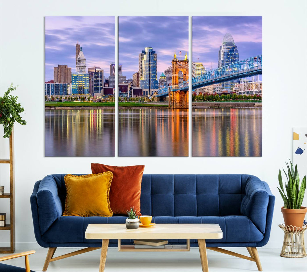 The wall art titled "Cincinnati City Lights Sunset Purple Cloudy Skyline Cityscape View" is beautifully printed on museum-quality canvases with a UV-protective coating and is ready to hang.