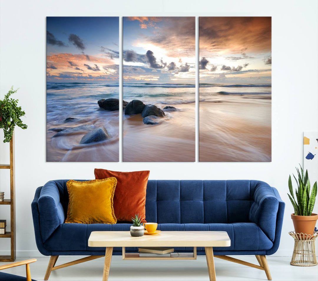 The "Serene Weather On The Beach Wall Art Canvas Print," featuring a tranquil beach scene with rocks and waves, is ready to hang and enjoy.