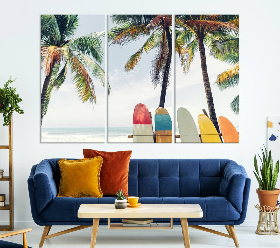 The room showcases The Palm and Surfing Board Wall Art Canvas Print, a triptych of palm trees and surfboards by the beach, elegantly gallery wrapped for a sophisticated finish.