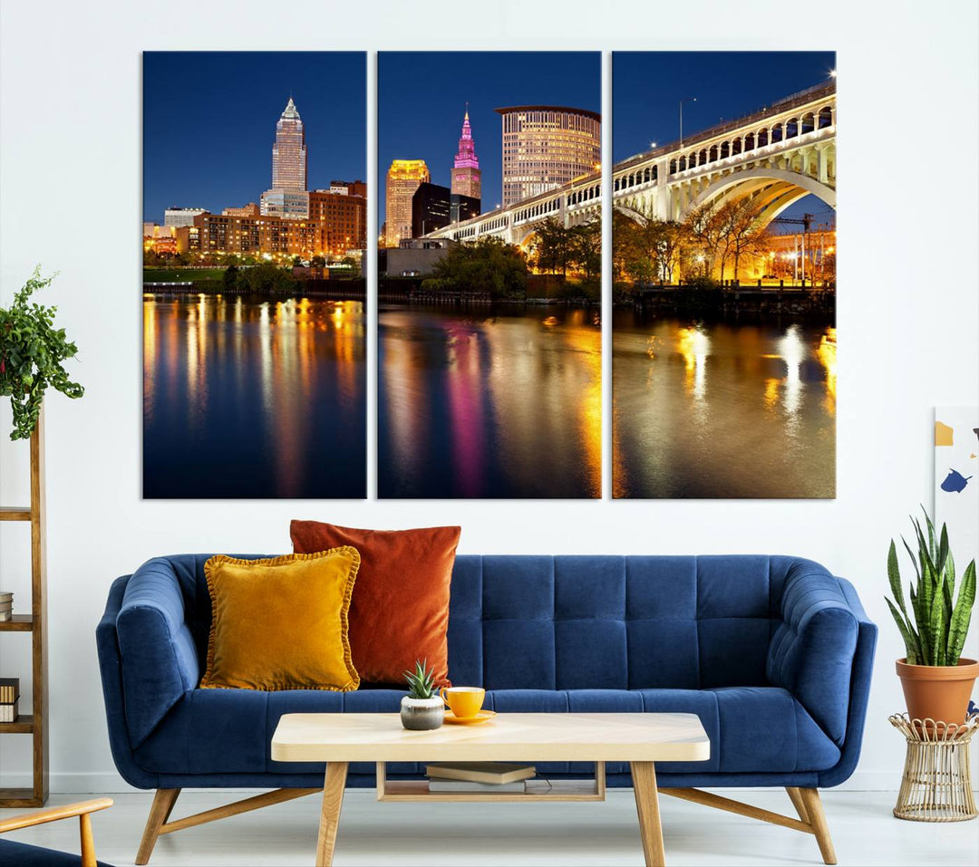 The "Cleveland Night Skyline Wall Art City Cityscape Canvas Print" is a striking feature in the room, showcasing a city skyline with a bridge reflecting in a river. Displayed on museum-quality canvas, it offers enduring beauty.