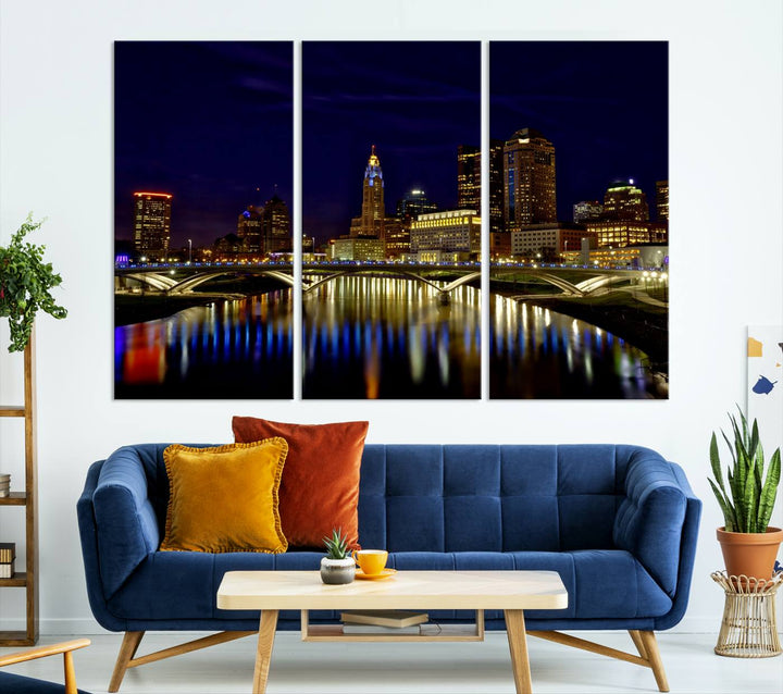 The "Columbus City Lights Night Skyline Cityscape View Wall Art Canvas Print" showcases a stunning city skyline at night, with illuminated buildings and bridges reflecting in the river, on a museum-quality canvas ready to hang.