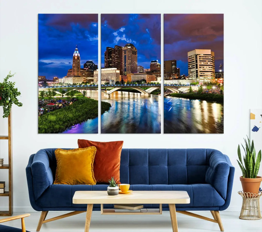 Columbus City Lights Night Bright Blue Cloudy Skyline Cityscape View Wall Art Canvas Print, gallery wrapped on museum-quality canvas, reflecting on a river.