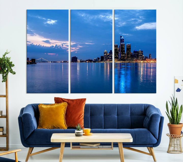 The "Detroit City Lights Night Blue Cloudy Skyline Cityscape View" wall art, displayed on museum-quality canvases, is split into three gallery-wrapped panels.