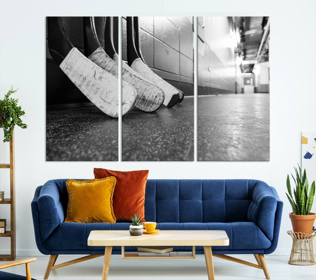 A living room featuring a large Ice Hockey Wall Art Canvas Print on gallery-wrapped canvas.