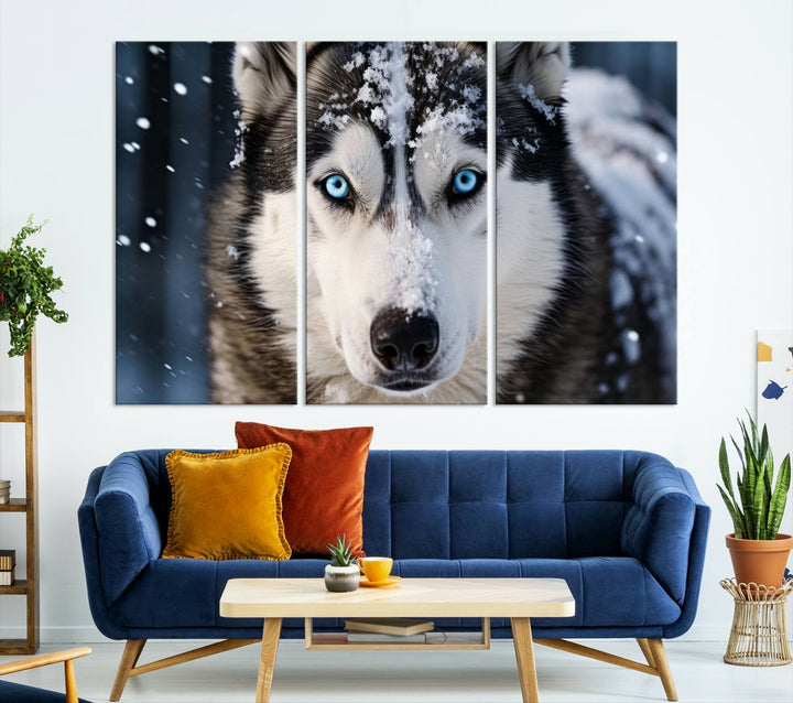 A digital art piece titled "Winter Siberian Husky Wolf Wall Art Canvas Print" showcases a blue-eyed husky blanketed in snow. Printed on high-quality canvas, it is an ideal choice for nature and dog enthusiasts.