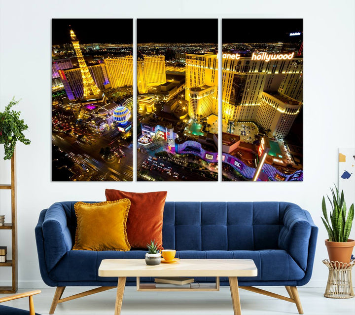 The modern living room features a Las Vegas Wall Art Canvas Print, a museum-quality triptych showcasing a vibrant cityscape with neon lights.