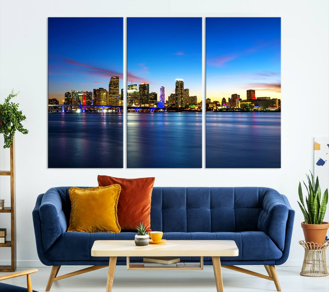 The living room features a Miami City Wall Art Canvas Print—a gallery-wrapped triptych displaying a city skyline at dusk, adding museum-quality elegance to the space.