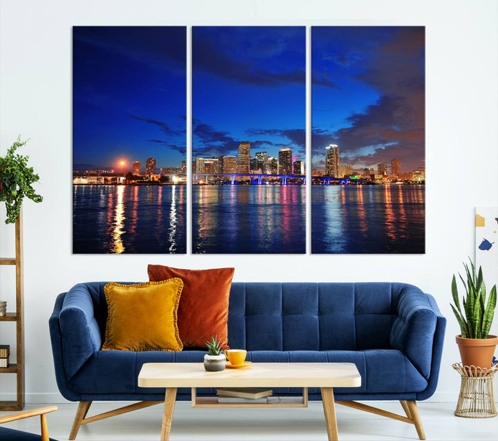 A large Miami City View Wall Art Canvas Print featuring the Miami City Skyline Panorama at night is displayed above the dresser.