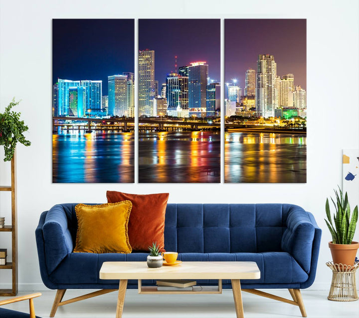 A stunning Miami City Wall Art Canvas Print on museum-quality canvas depicts a vibrant cityscape at night with colorful reflections.