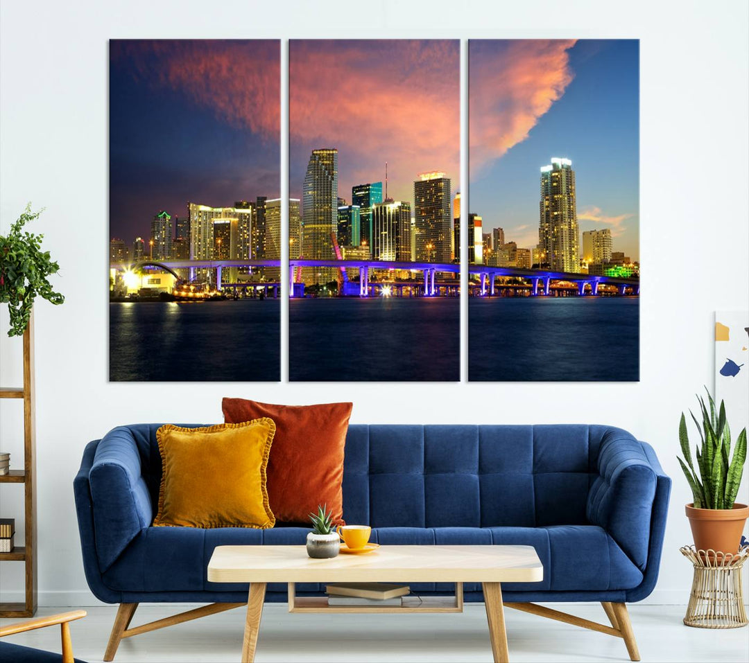 The modern living room is enhanced by the "Miami City Wall Art Canvas Print," a stunning triptych portraying a city skyline at sunset. These canvases are gallery wrapped and made from museum-quality materials, featuring a UV-protective coating to ensure lasting vibrancy.