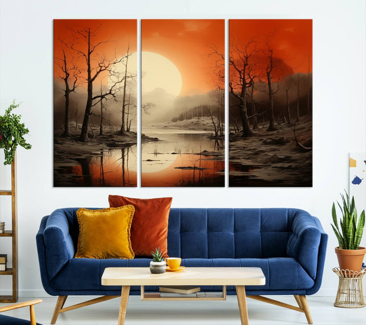 The "Abstract Watercolor Trees and Sunset on Lake Wall Art" is a triptych masterpiece, showcasing an orange-hued landscape of barren trees and a large sun. Displayed on museum-quality canvases with UV-protective coating, it creates a striking visual element in any space.