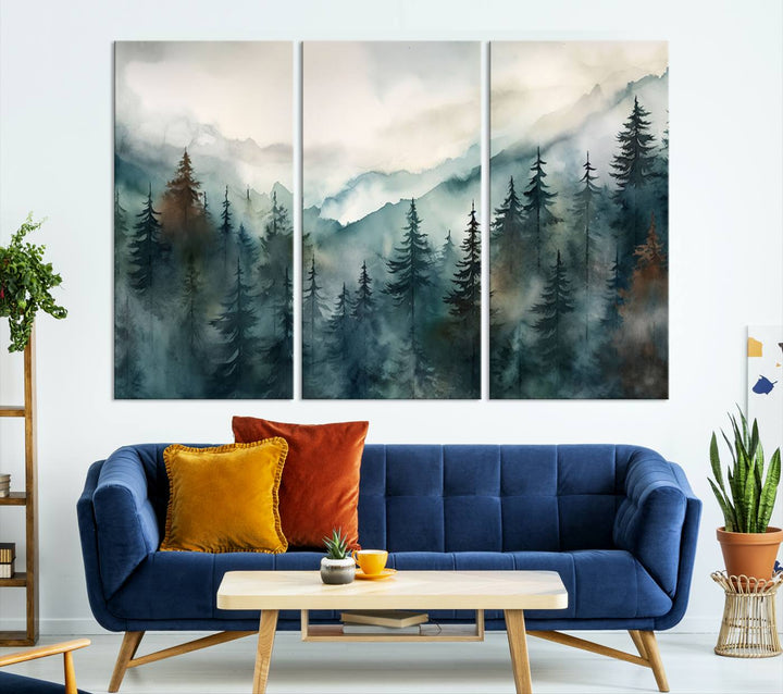 A set of Serenity Forest Wall Art Canvas prints, showcasing foggy mountain landscapes, is displayed in the living room.