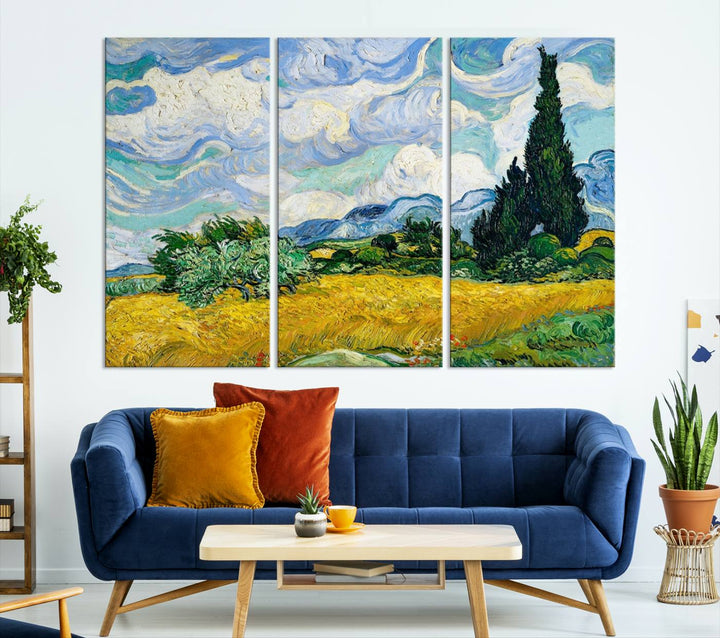 A contemporary living room features a large triptych of "Wheatfield With Cypresses By Van Gogh Painting Wall Art Canvas Print." Crafted on museum-quality canvas, this artwork brings a sense of elegance and craftsmanship reminiscent of professional artistry.