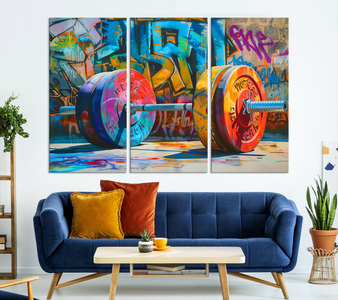 The Fitness Gym Barbell Graffiti Wall Art Canvas Print, a vibrant triptych featuring a barbell against a graffiti backdrop, elegantly hangs in the room. Crafted on premium canvas with a gallery-quality finish, this stunning piece of wall art effortlessly combines urban flair with sophisticated decor.