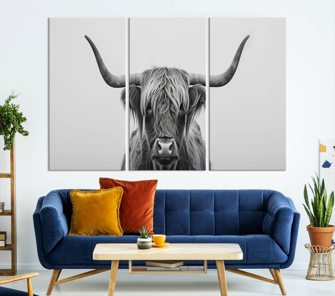 A triptych titled "Farmhouse Longhorn Wall Art Canvas Print, Longhorn Texas Wall Art Canvas Print," rendered in a gallery-quality finish, hangs prominently on the wall.