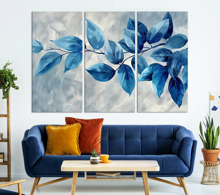 A Blue Leaf Abstract Wall Art Canvas Print, featuring a textured background and gallery-quality finish, is displayed.