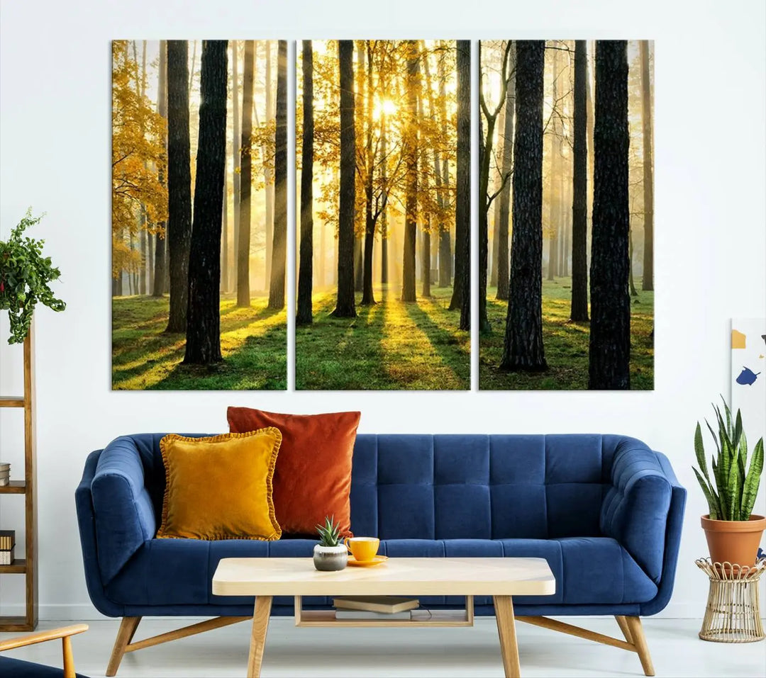 The living room is enhanced by the "Wall Art Landscape Canvas Print Tall Trees in Forest at Sunset" on museum-quality canvas. This triptych, complete with a UV-protective coating, is ready to hang and adds an artistic touch to the space.