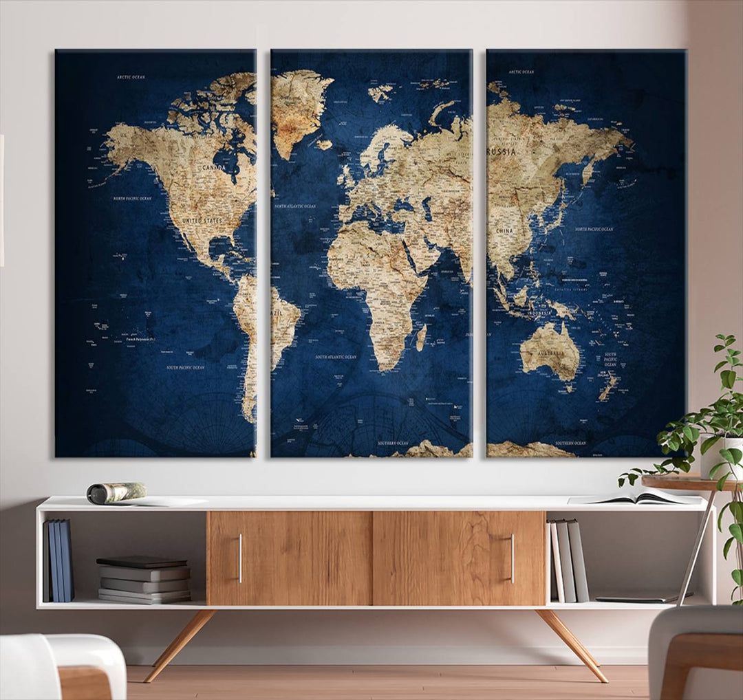 A triptych canvas print titled "Vintage Blue World Map Canvas Print - Classic World Map Design on Deep Blue Wall Art Print" adorns the wall, enhancing the decor with its antique style.