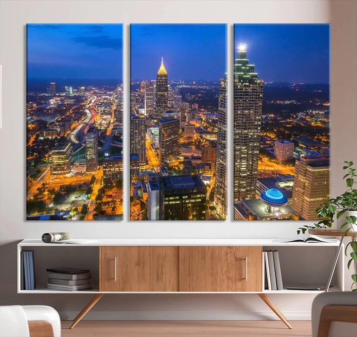 An elegant Atlanta City Blue Skyline Cityscape View Wall Art Canvas Print graces the wall, offering a sophisticated addition to your living space. Enjoy free shipping on this stylish piece.