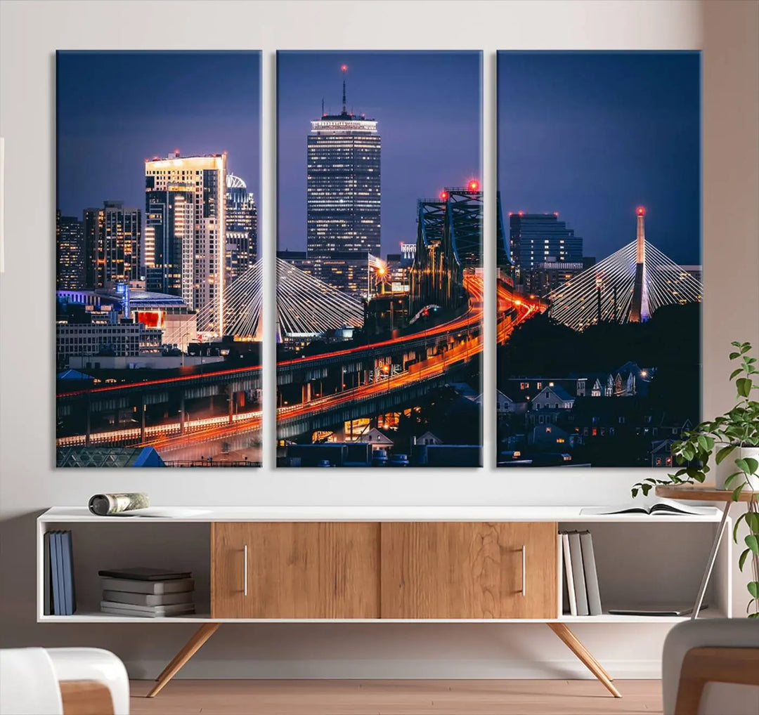 The "Boston City Lights Night Skyline Cityscape View" artwork on the wall showcases a brightly lit bridge at night. It is displayed on museum-quality canvas with a UV-protective coating.