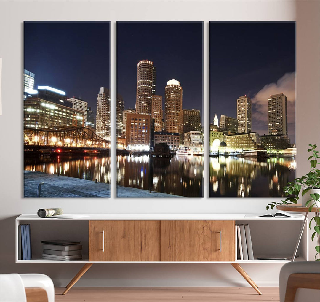 The Boston City Lights Skyline Cityscape View Wall Art Canvas Print showcases a nighttime cityscape on museum-quality canvas.