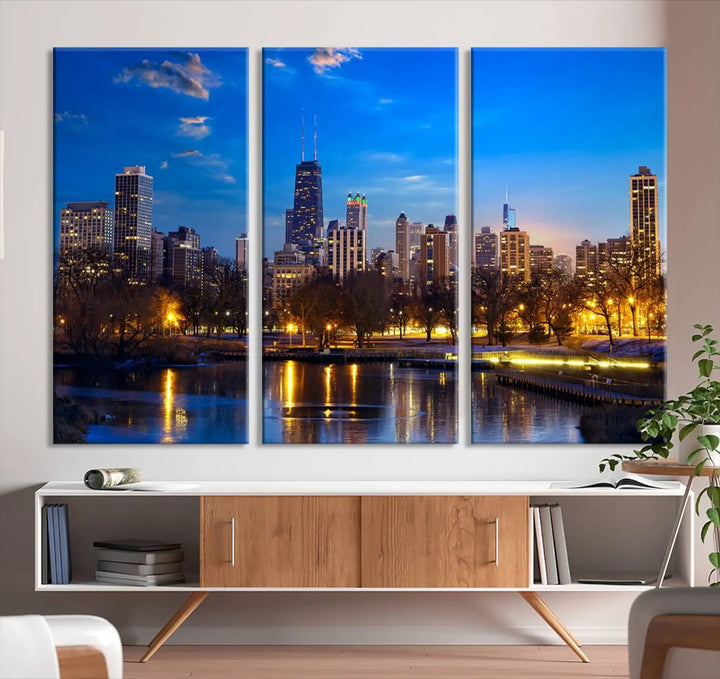 A triptych photo titled "Chicago City Lights Night Blue Skyline Cityscape View Wall Art Canvas Print" is elegantly displayed on gallery-wrapped, museum-quality canvases.