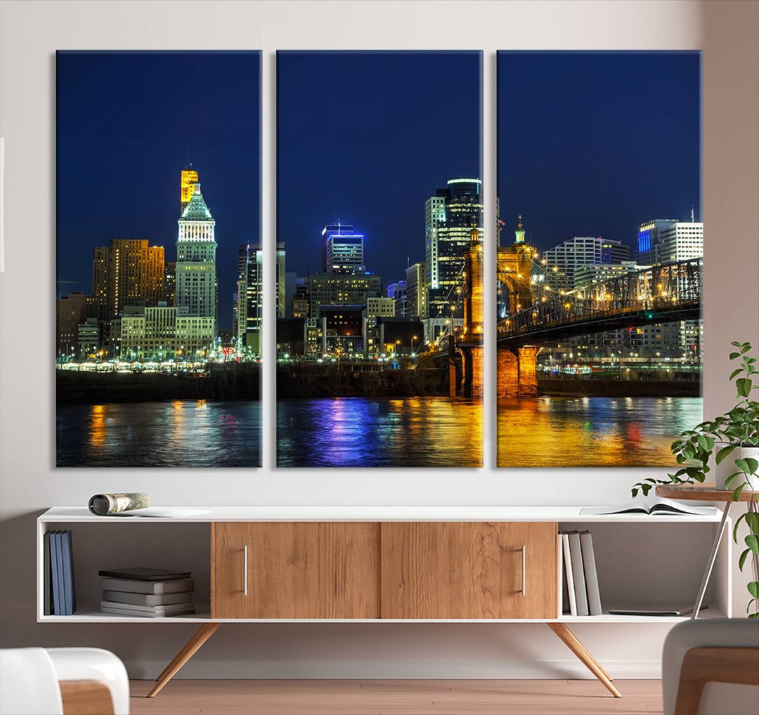 The "Cincinnati City Lights Night Skyline Cityscape" canvas print, displayed above a sofa, exhibits museum-quality craftsmanship with a UV-protective coating.