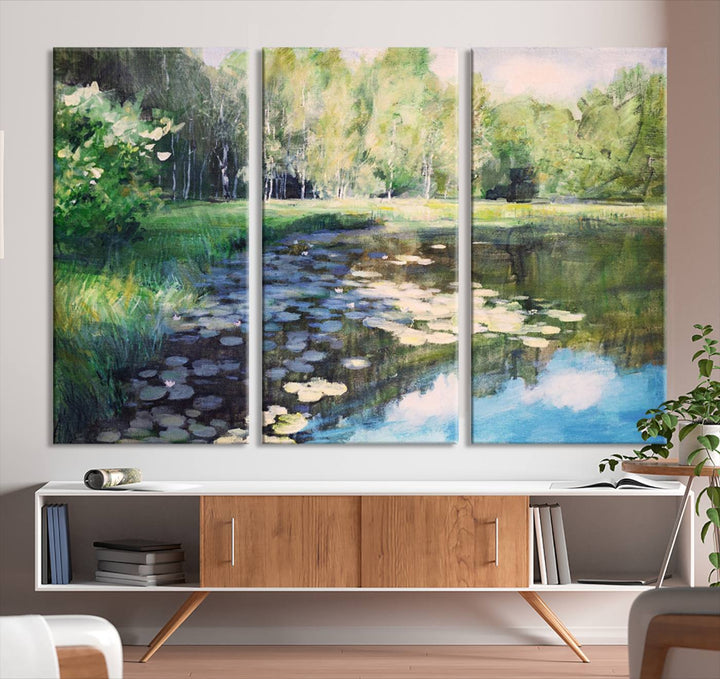 The "Forest Pond River Lake Wall Art Canvas Print" showcases a serene lakeside landscape with trees and water lilies. Crafted on museum-quality canvases and enhanced with UV-protective coating, this piece serves as an elegant addition to any space.