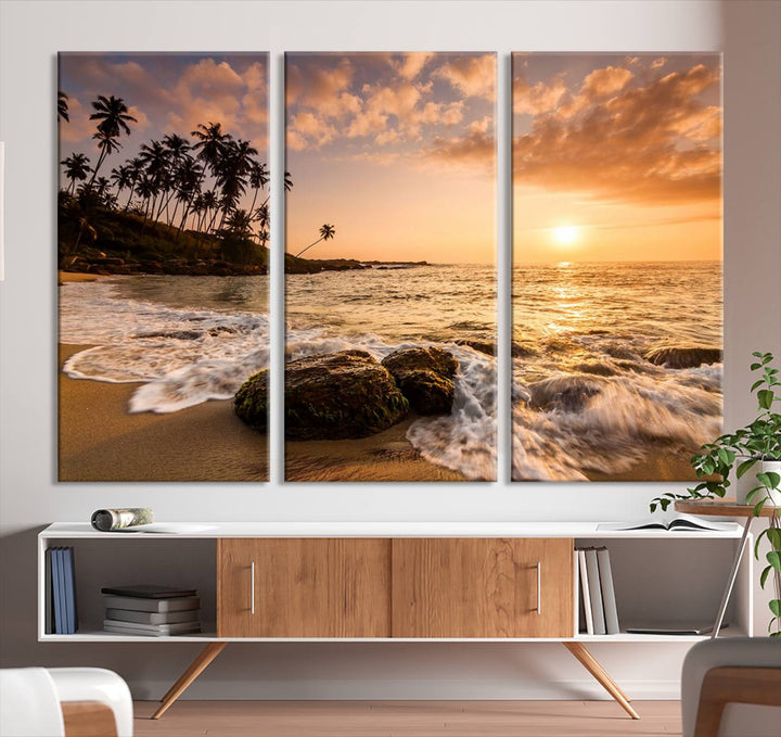 The "Tropical Island Sunset Sunrise Wall Art Canvas Print" is a stunning triptych that showcases a tranquil beach sunset complete with waves and palm trees. Each canvas piece is meticulously hand-assembled and framed using museum-quality polycotton with a UV-protective coating to ensure enduring beauty.